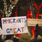 crowd supporting immigrants